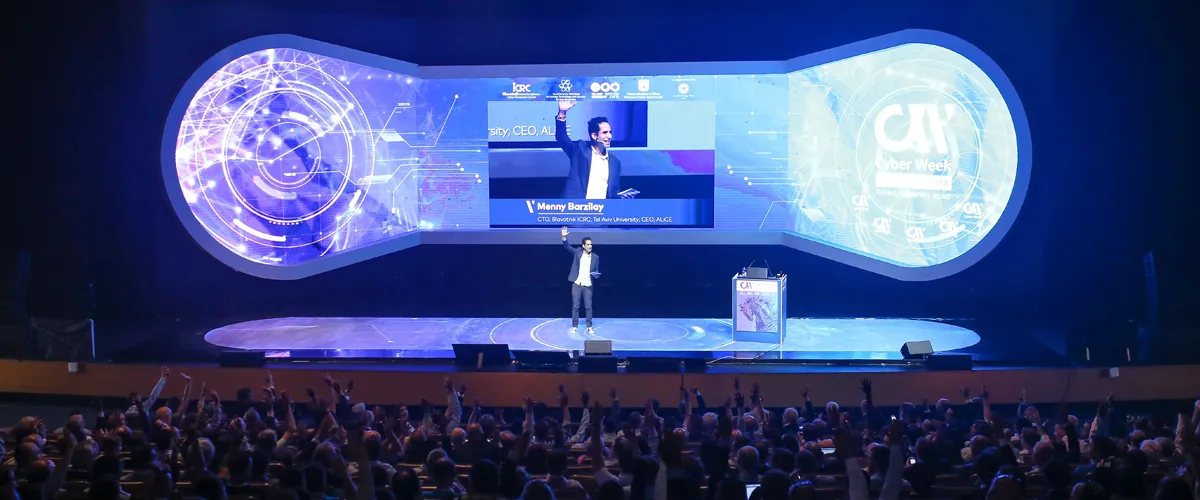 A packed auditorium at Cyber Week with Menny Barzilay on the main stage